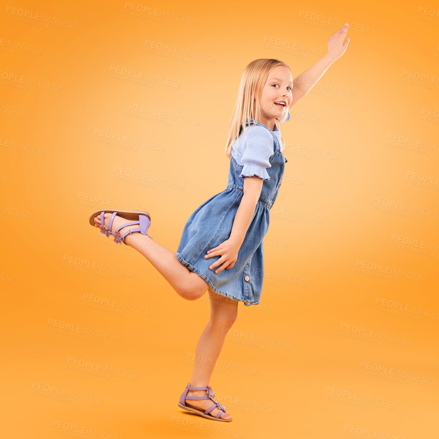 Buy stock photo Portrait, girl and kid with a smile, fly or fantasy with joy, happiness or excited on a yellow studio background. Person, model or child with power, hero game or imagine with energy, happy or playful