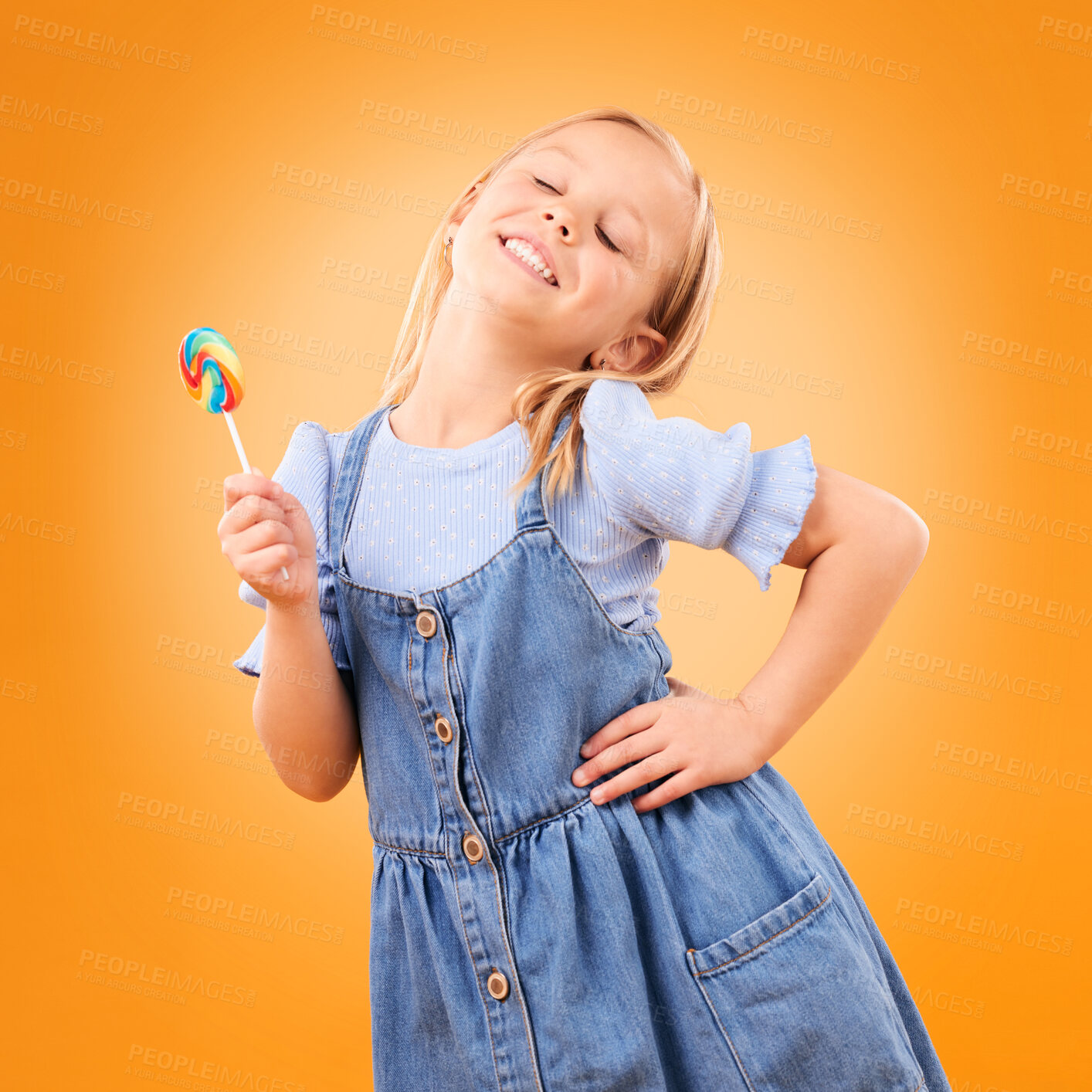 Buy stock photo Happy, lollipop and girl child with candy, hungry for dessert  
and isolated on an orange background in studio. Smile, sweets and young kid with sugar, unhealthy food and eating confectionery treats