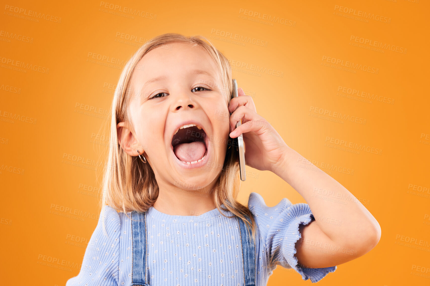 Buy stock photo Girl, kid and portrait with phone call, smile and conversation on a yellow studio background. Face, person and child with a smartphone, connection and communication with happiness, network or talking