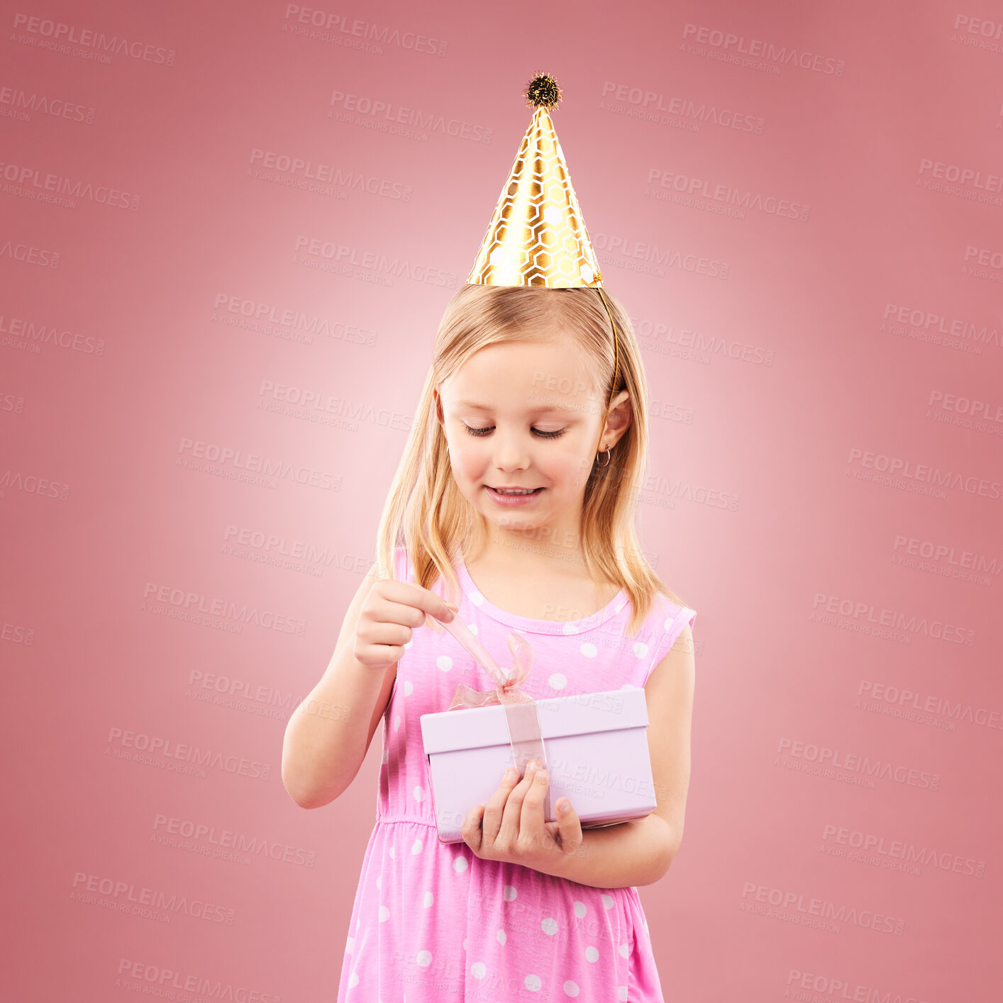 Buy stock photo Present, birthday hat and child open gift box for holiday party or happy celebration. Excited girl on a pink background for surprise, giveaway prize or celebrate win at event with a ribbon and joy