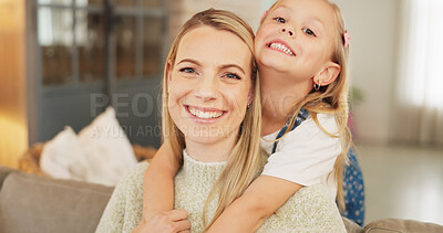 Buy stock photo Portrait, hug and mother with girl child on a sofa with care, happy and bond in family home. Smile, face and mom with cute kid in a living room relax with love, trust and support or piggyback games