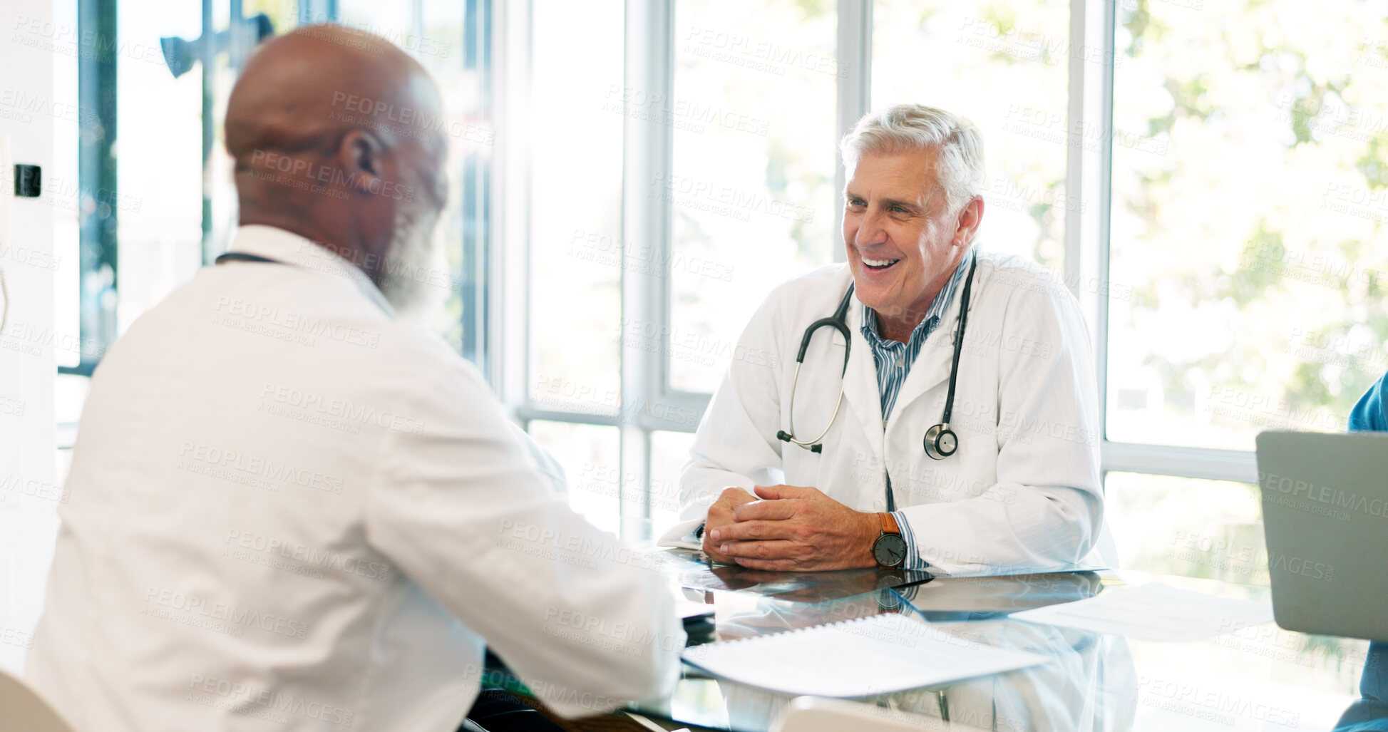 Buy stock photo Hospital, meeting and teamwork with men doctors in office happy while planning, conversation or consulting for advice. Healthcare, collaboration and man for feedback, strategy or support discussion