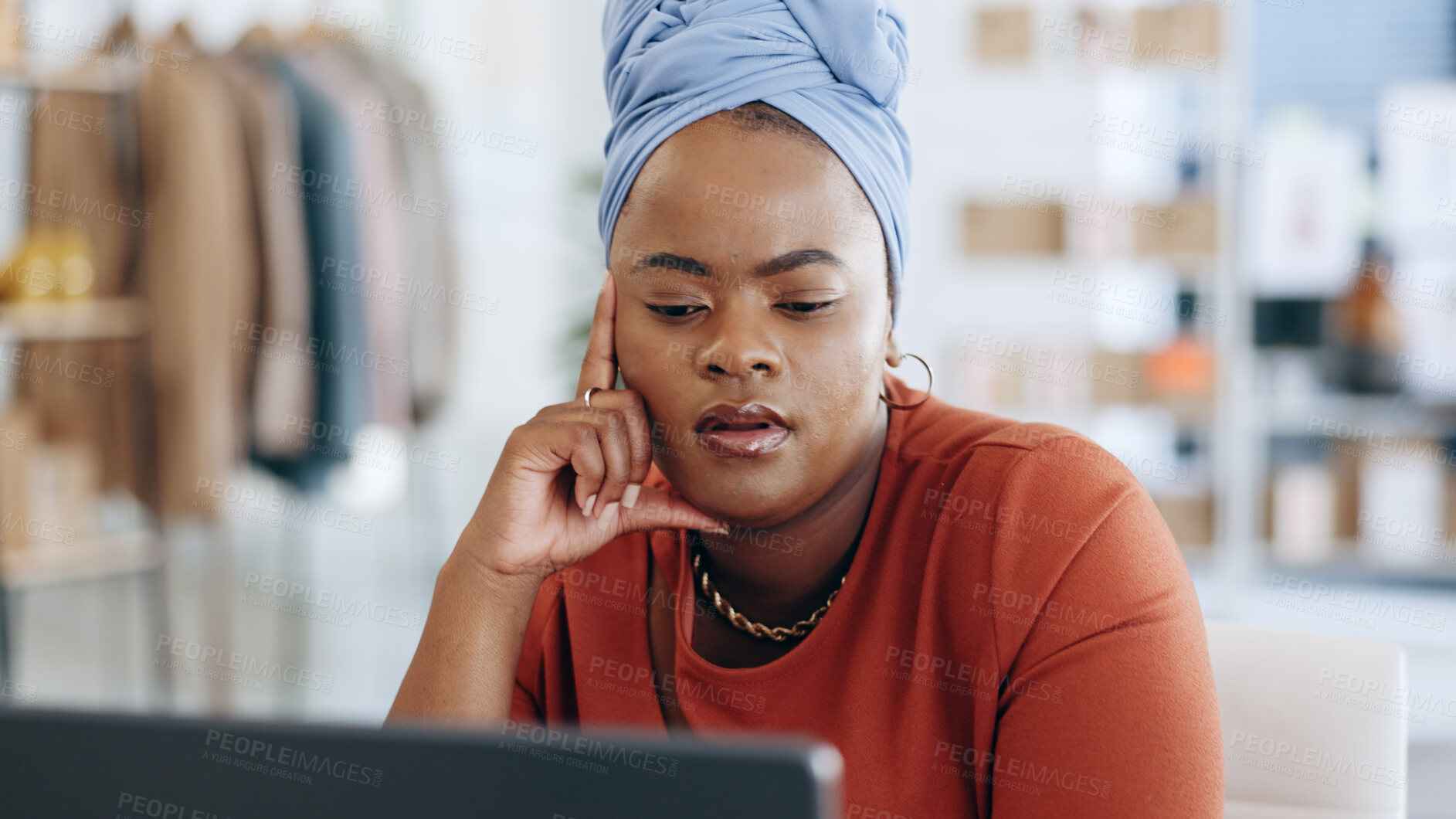 Buy stock photo Thinking, designer and serious black woman on laptop in office, planning or brainstorming for decision making.  Computer, professional problem solving or idea for fashion in creative business startup