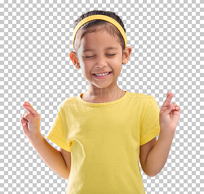 Child, hand and fingers crossed in studio for hope, wish or good luck against a blue background. Girl, eyes closed and emoji hands, praying and wishing, happy and smile while posing on isolated space