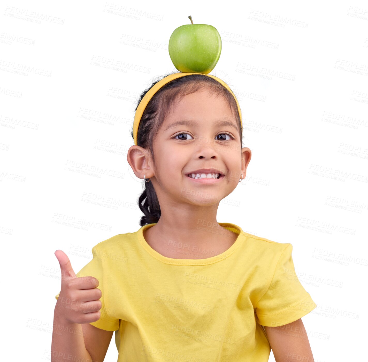 Buy stock photo Thumbs up, apple and portrait of a girl kid with a healthy, wellness or nutrition diet. Happy, smile and face of child model with fruit on head with yes gesture isolated by transparent png background