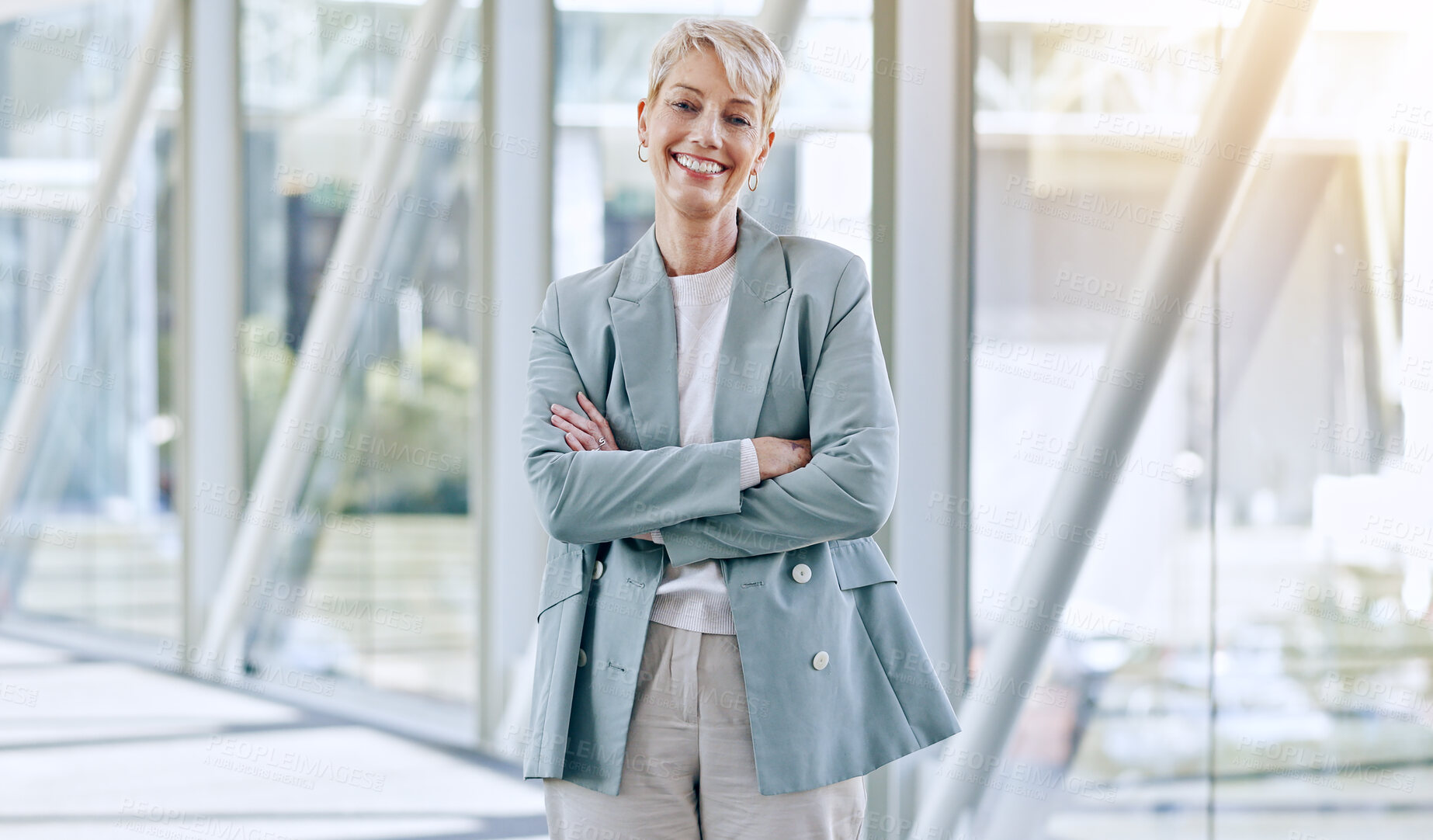 Buy stock photo Professional portrait, arms crossed and mature happy woman confident in company success, career or management. Happiness, pride and business agency CEO, director or manager smile for job experience