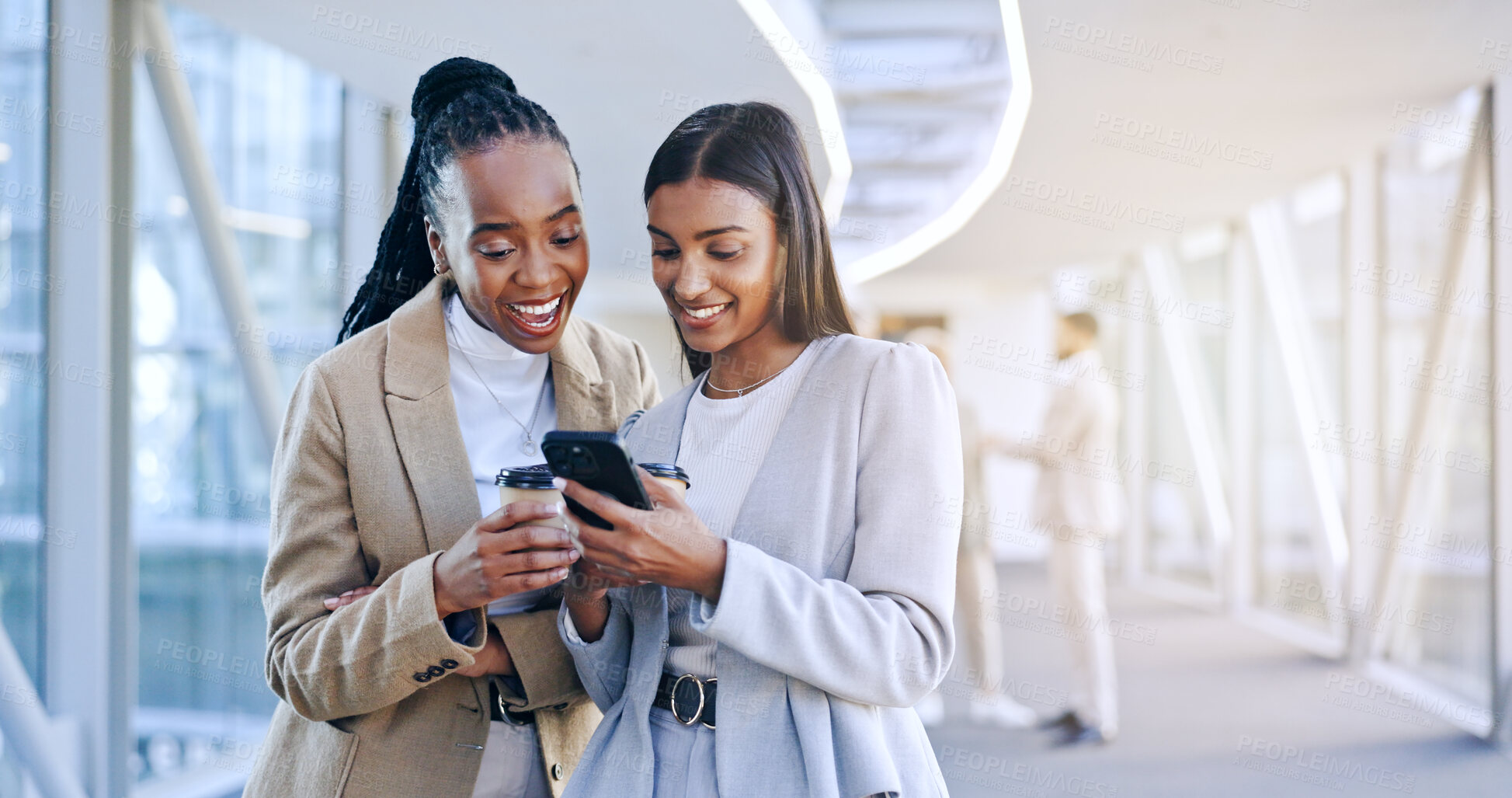 Buy stock photo Women, phone and coffee or social media on lunch, happy and funny joke or message or blog post. Diversity coworkers, fun and internet on smartphone, break and tea time for business people to relax