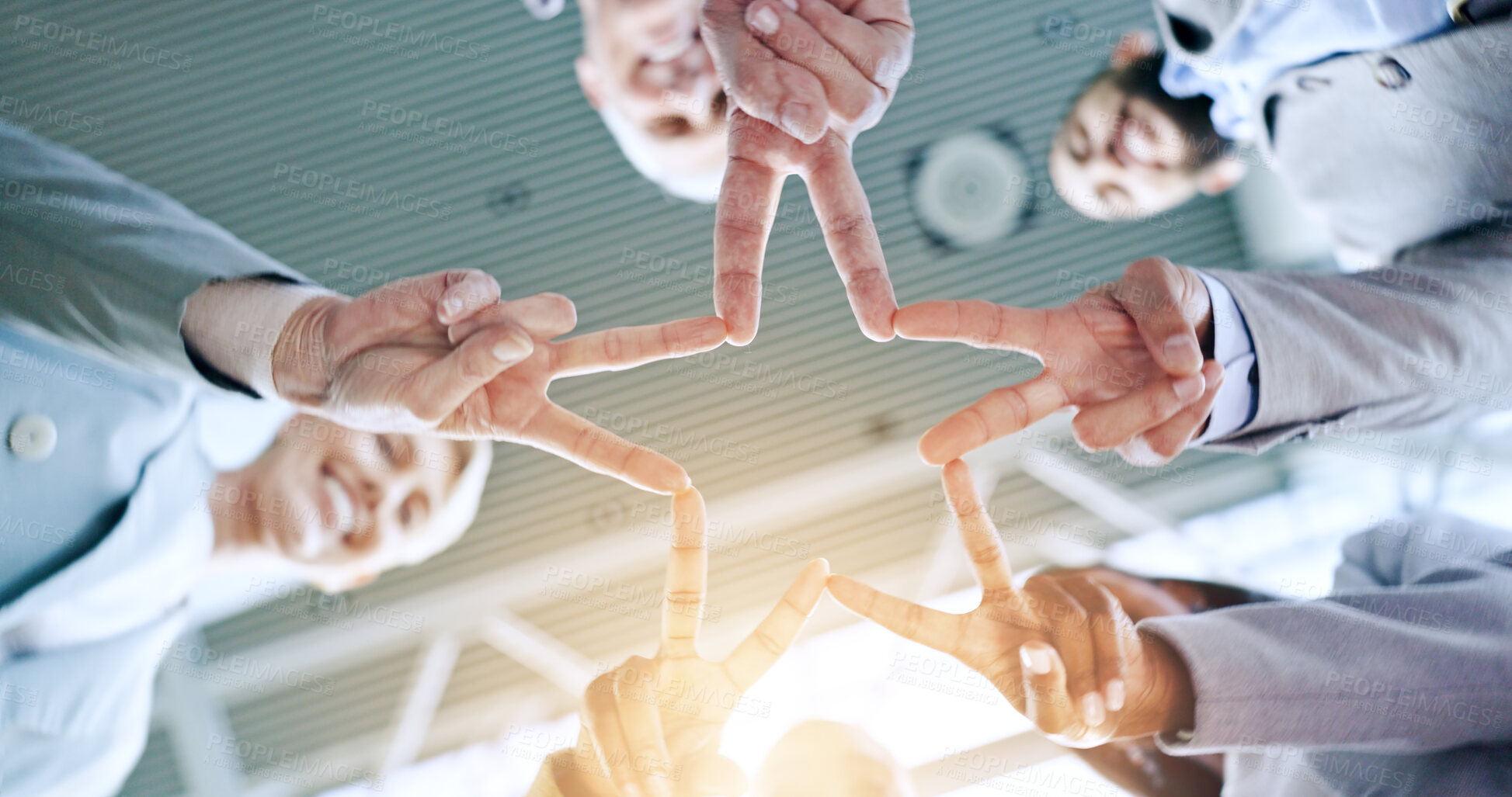 Buy stock photo Collaboration, star fingers and a business team in the office from below for corporate work with flare. Teamwork, hands and partnership with a professional employee group in the workplace closeup