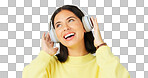 Face, green screen and woman with headphones, dance and music streaming against a studio background. Portrait, female and person with headset, listening to audio and sounds for movement and smile