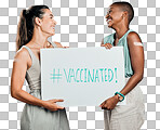 Covid vaccinated African american and mixed race women showing and holding poster. Two people isolated on red studio background with copyspace. Showing plaster on arm and promoting corona vaccine