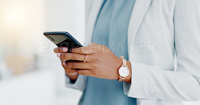Black woman, hands and phone texting in business for communication, social media or chatting at the office. Hand of African American female typing on smartphone or mobile app for research or chat