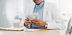 Black woman, calculator and money in business finance for budget, costs or expenses at the office desk. Hands of African female accountant counting and calculating cash on table for company profit