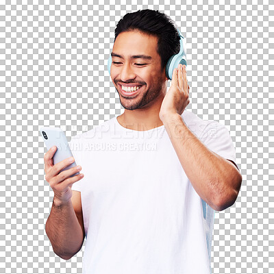 Headphones, music and Asian man with smartphone for listening in studio isolated on a blue background. Radio, smile and person with mobile, sound or hearing podcast, audio or social media on internet