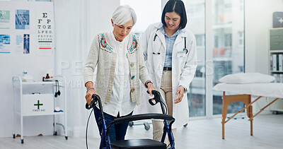 Old woman, doctor and physiotherapy with walking frame for support, help and healthcare. Senior, medical professional and person with a disability in hospital, rehabilitation and physical therapy.
