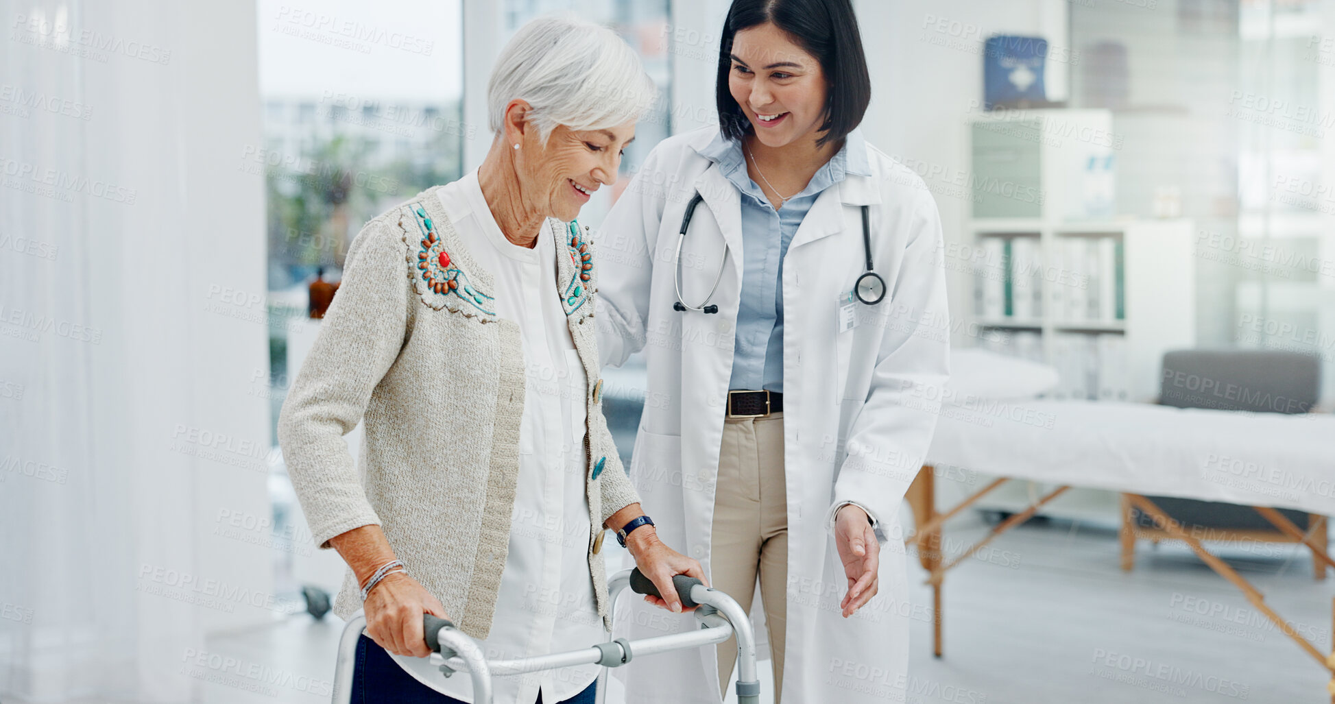 Buy stock photo Doctor, elderly woman and walking frame for healthcare service, physiotherapy support and clinic progress. Medical worker helping, consulting and physical therapy of a senior patient with disability