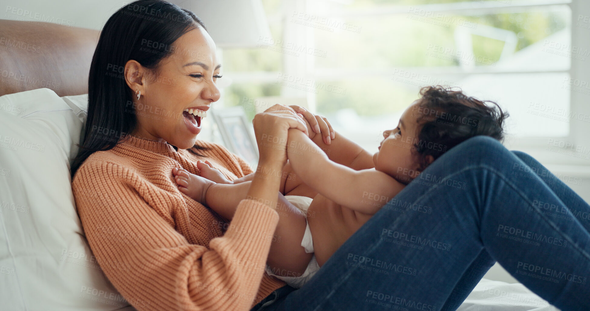 Buy stock photo Excited, play and mother with baby on bed for care, connection and bonding. Funny, playful and mom with newborn in bedroom, laugh and happy family relax together for love, support and smile in home