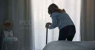 Balance, medical and window with old woman and walking stick in bedroom for wellness, retirement and healthcare. Depression, mental health and nursing home with patient with a disability for support