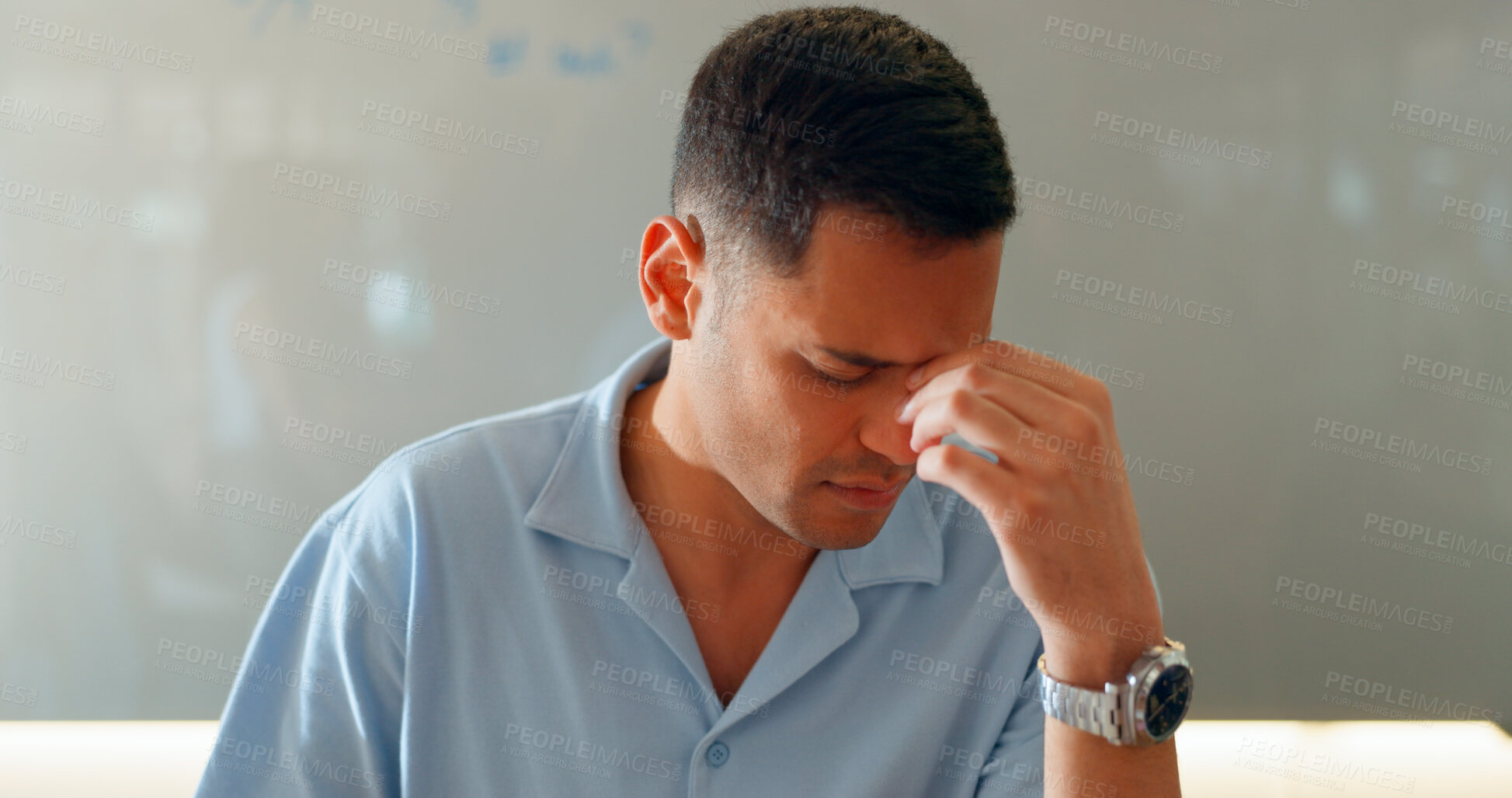 Buy stock photo Stress, headache and a business man in the office for an audit while thinking about tax or compliance. Burnout, pain or pressure with a frustrated young employee in the workplace for a deadline