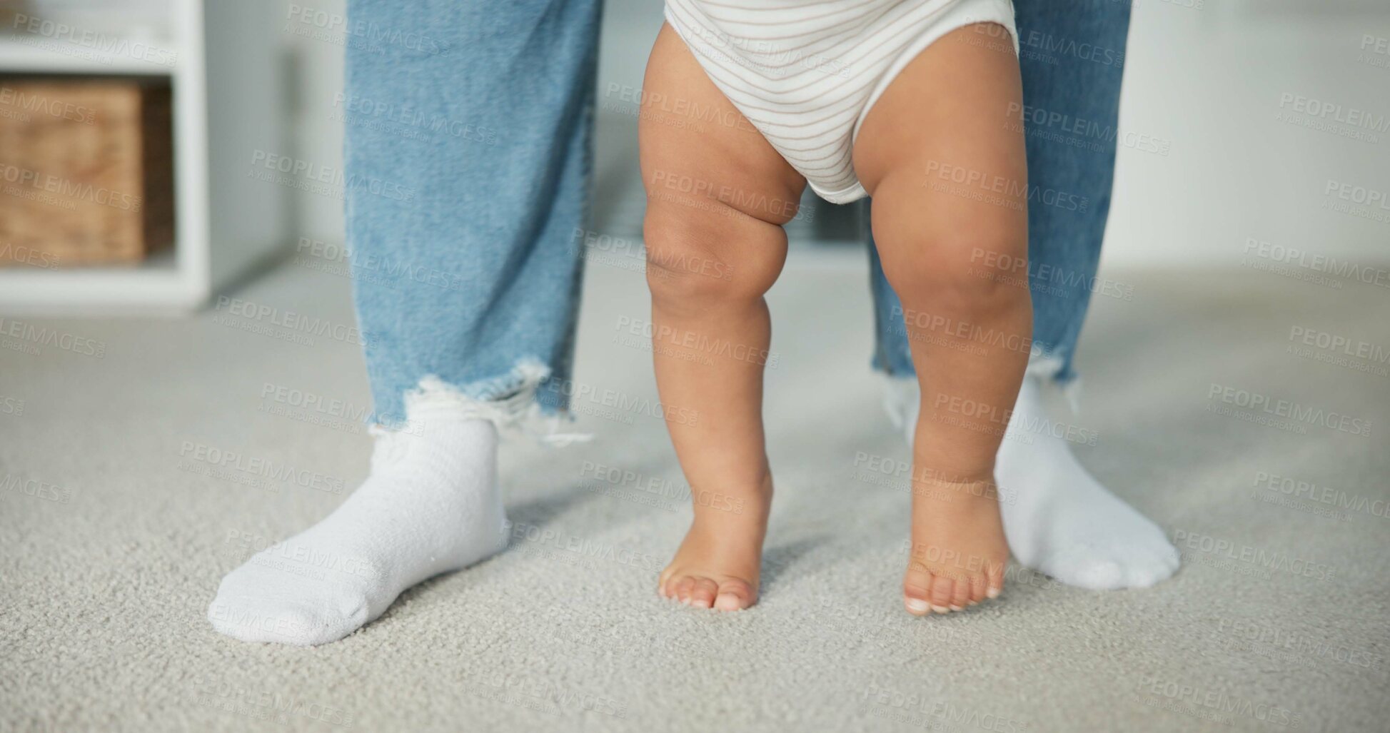 Buy stock photo Legs, baby learning to walk with parents and growth, development and early childhood with motor skills. Family, support and first steps with trust, progress and balance with milestone and feet