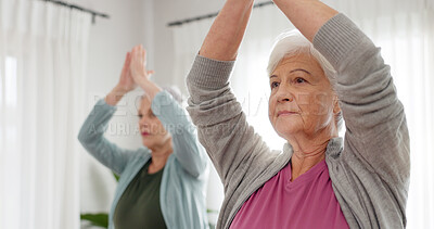 Senior women, yoga and class with friends and retirement home caregiver with a smile. Fitness, elderly group and workout for wellness and health with nurse in a living room with exercise to relax