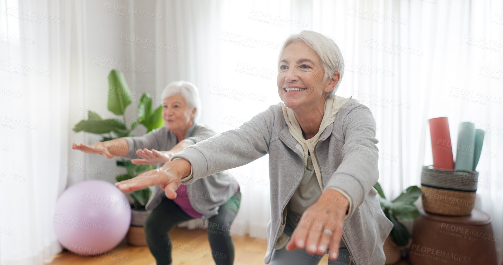 Buy stock photo Senior, woman and friends or yoga in home for fitness health, balance or wellness training. Elderly people, smile and squat for strong pilates support for retirement joy, body happiness or workout