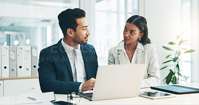 Businessman, laptop and team in finance discussion, project planning or schedule at office. Asian man and business woman working on computer for corporate statistics or financial plan at workplace
