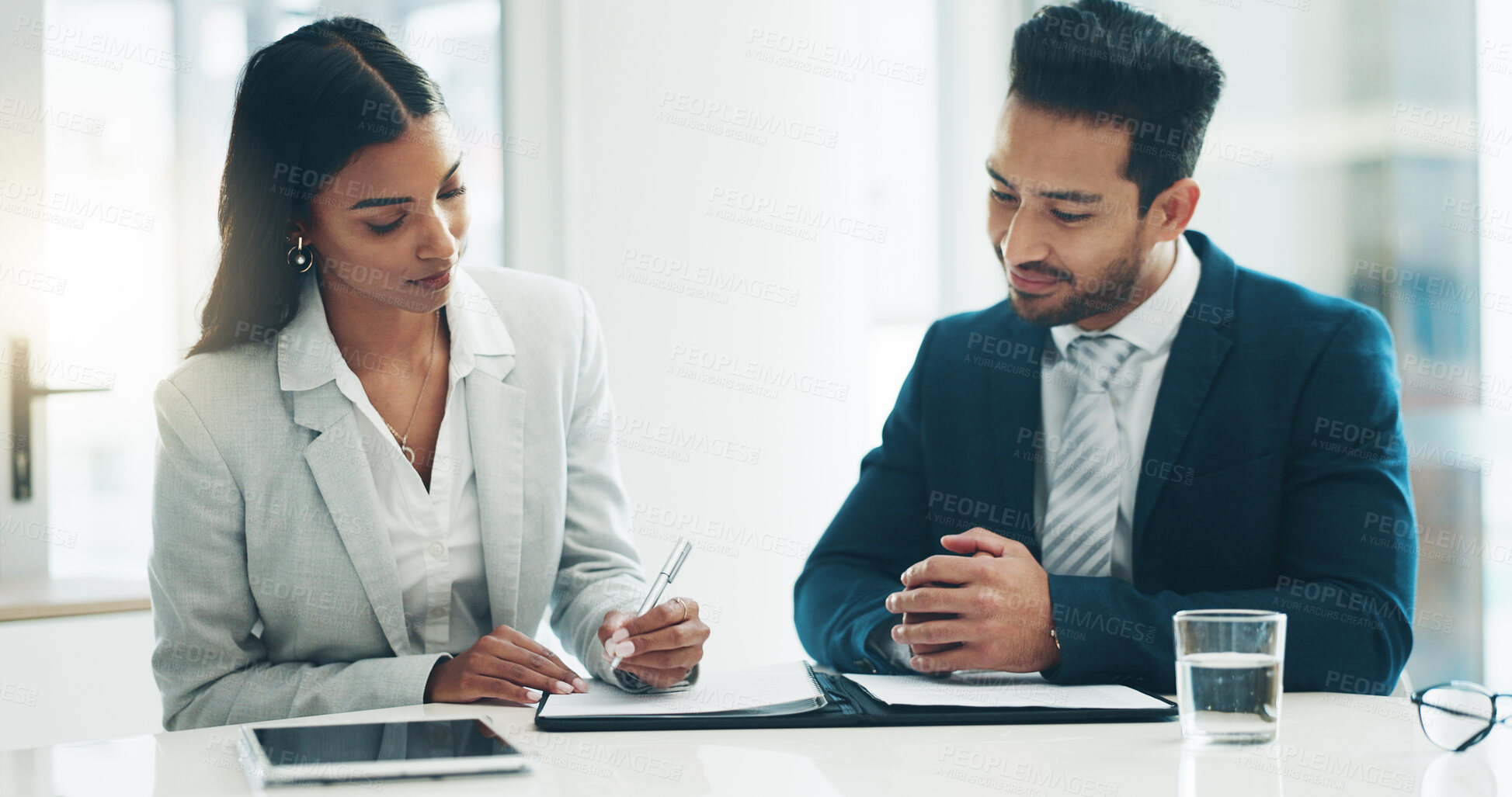 Buy stock photo Interview, human resources and contract with business people in the boardroom of an office together. Meeting, agreement or signature with a man and woman employee in the workplace for recruitment