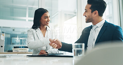 Businessman, woman and signature with handshake for contract, hiring or legal agreement on document at office. Asian man shaking hands with female person for partnership or recruiting at workplace