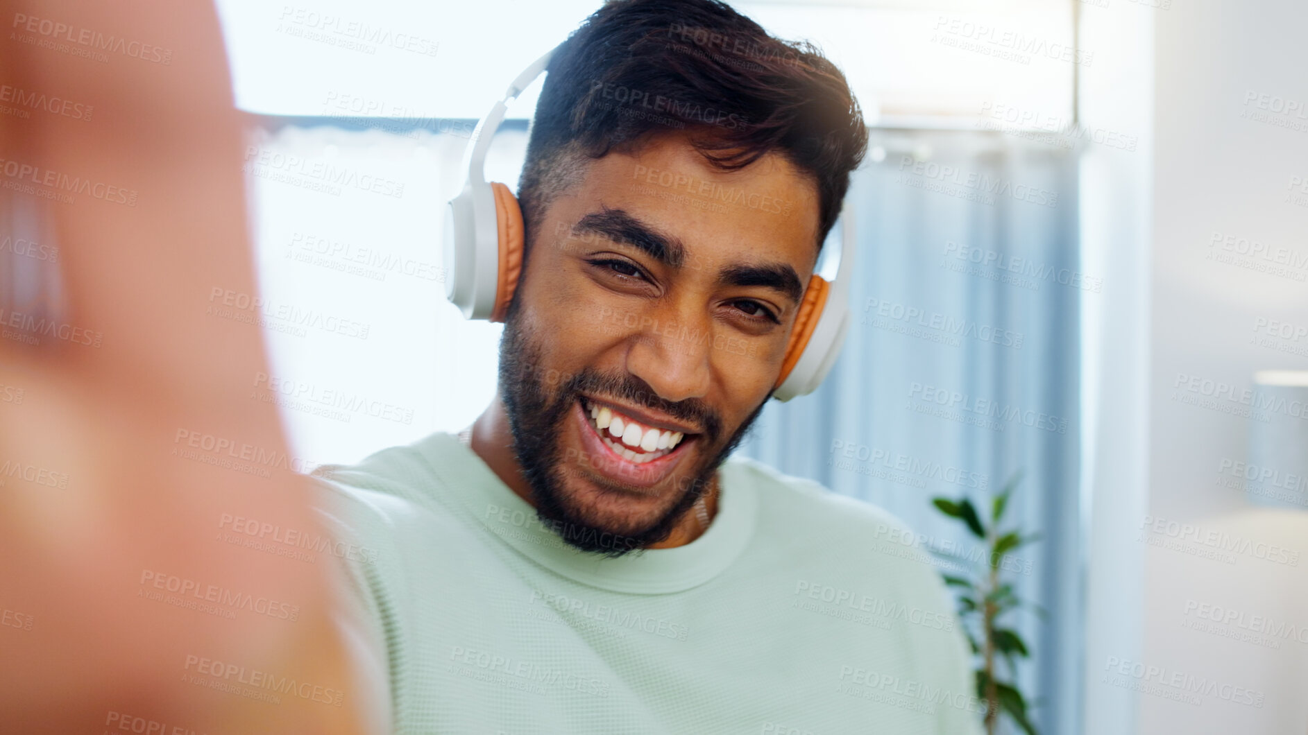 Buy stock photo Selfie, man and smiling with headphones for music playlist streaming and cheerful mood in home. Wellness laughing, audio and happy male ready to dance  photograph with smile.