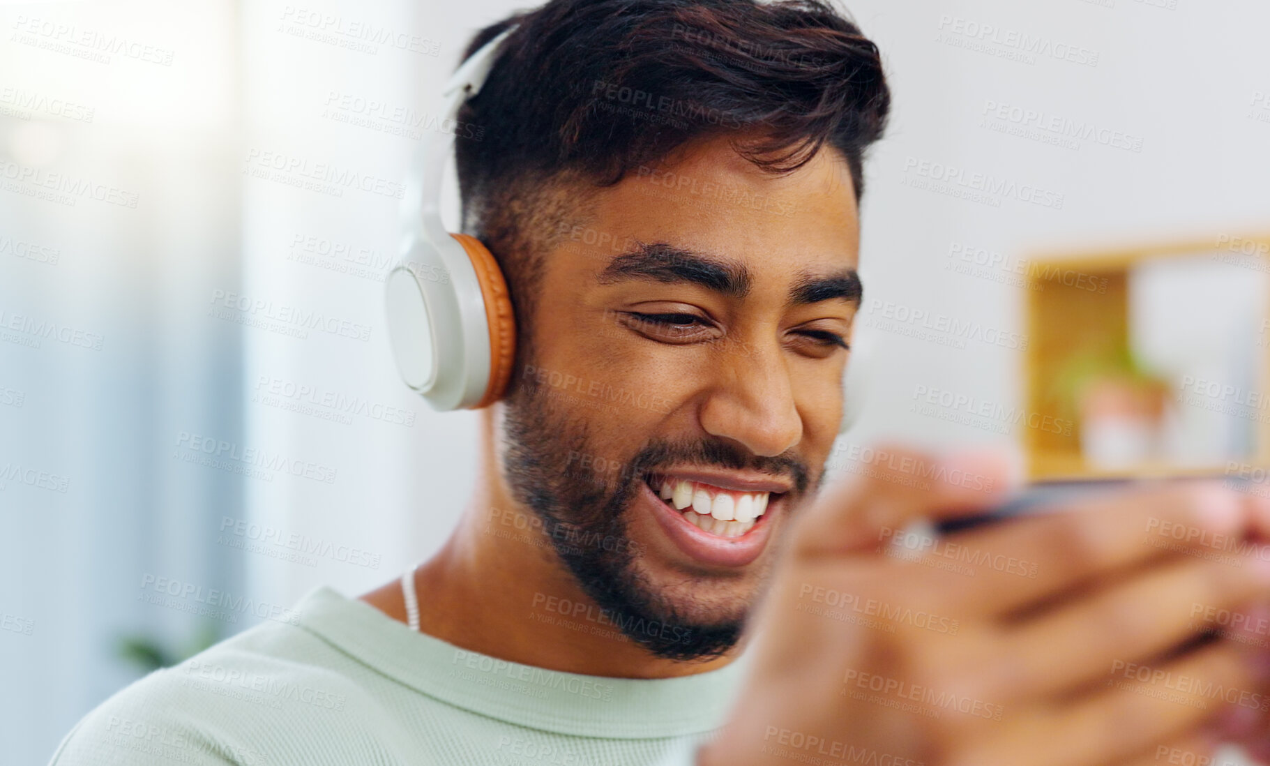 Buy stock photo Laugh, happy and mobile text of a black man typing on social media communication app. Laughing, internet scroll and web meme of a man online on a mobile phone texting and reading a funny joke