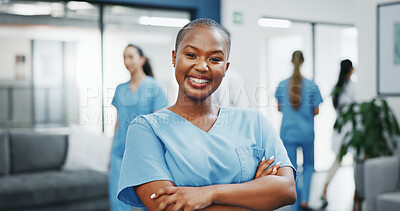 Nurse, face or arms crossed in busy hospital for about us, medical life insurance or wellness support. Smile, happy or healthcare black woman in portrait, confidence trust or help medicine internship