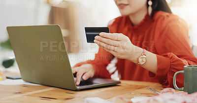 Woman hands, credit card and laptop for business online shopping, trading or fintech payment in office startup. Professional person typing bank information on computer for website loan or transaction