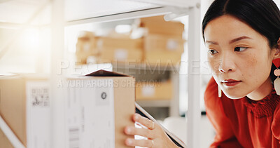 Buy stock photo Stock, planning and logistics with asian business owner doing inventory and ecommerce orders on tablet in office warehouse. Retail, management and woman factory manager writing list for shipping box delivery package