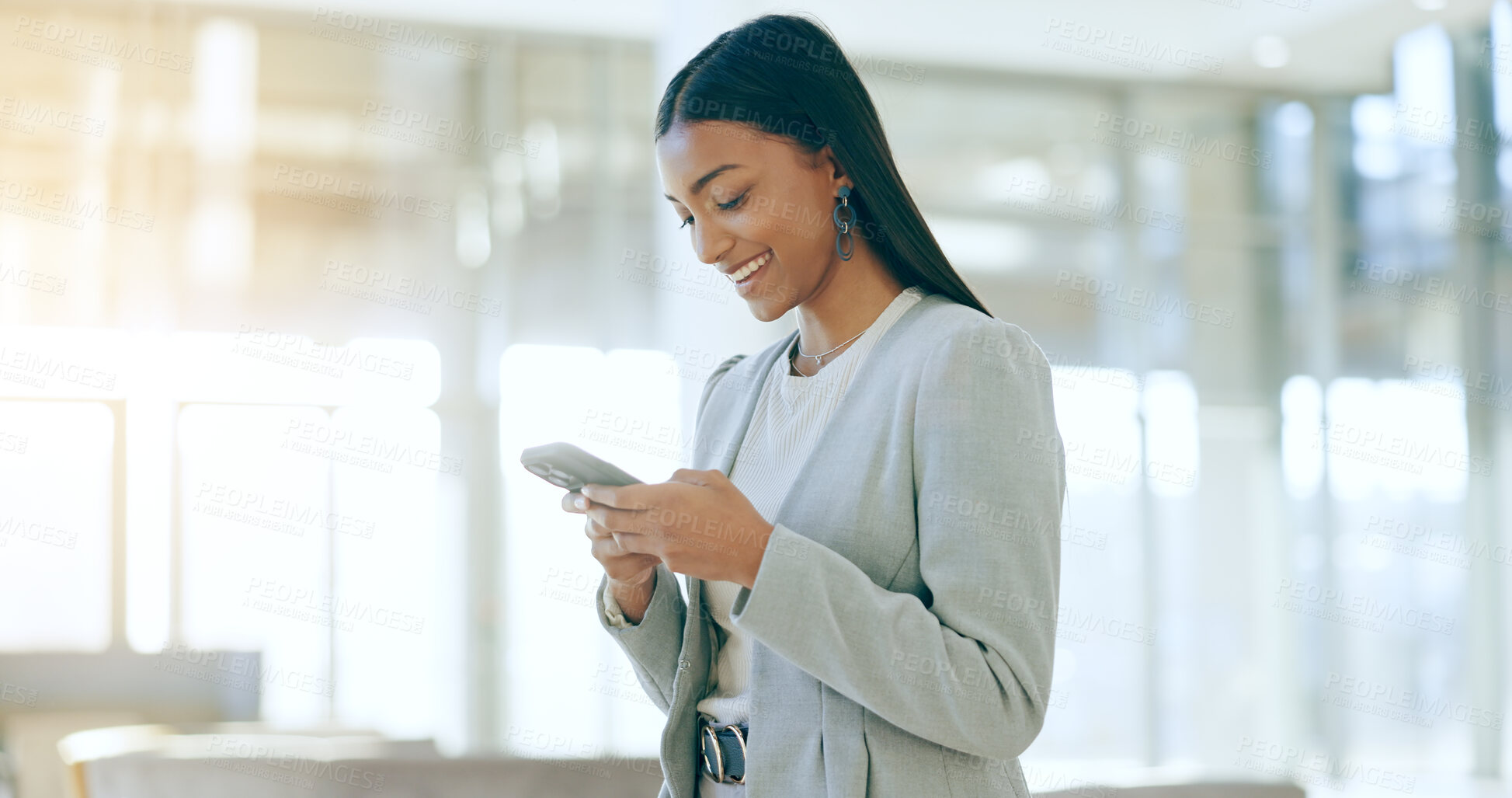 Buy stock photo Businesswoman, typing and communication on phone in office, social media and smile for networking. Happy woman, texting and email or chat on smartphone, mobile app and internet for online research