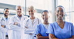 Face, black woman or medical team with arms crossed, group and smile in a hospital, career and diversity. Portrait, healthcare professionals and happy staff with collaboration, clinic and doctors