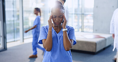 Headache, nurse and black woman with stress in hospital for burnout, overworked and fatigue. Healthcare, busy medical clinic and health worker with injury, strain and migraine for anxiety or crisis