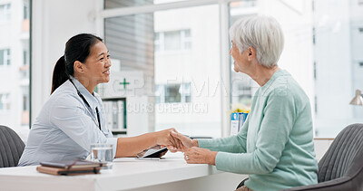 Buy stock photo Doctor handshake, senior woman and healthcare with thank you in a hospital for medical care. Elderly consultation, smile and insurance conversation with women in a clinic office for retirement advice