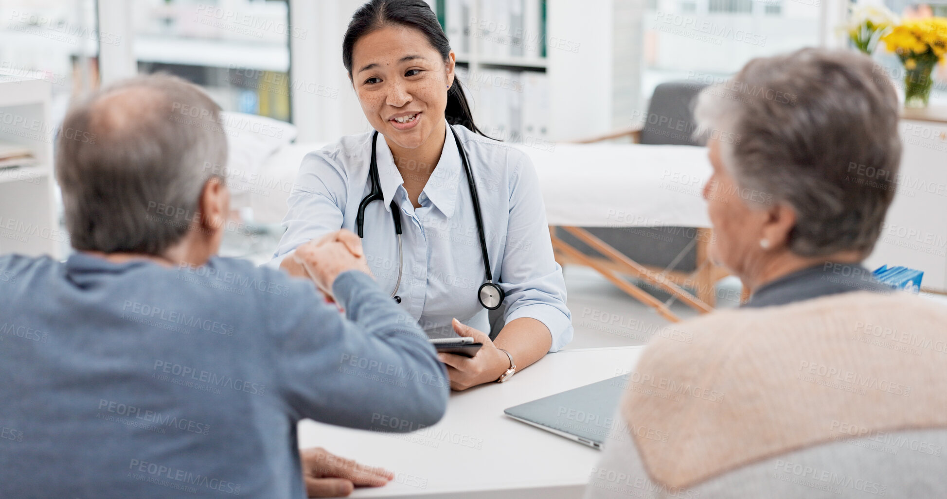 Buy stock photo Doctor consultation meeting, elderly couple and handshake for thank you, welcome and agreement for hospital insurance. Healthcare clinic, senior people and cardiology worker shaking hands for goodbye