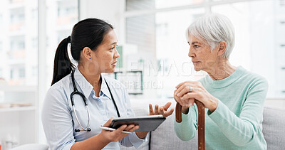 Talking, old woman or doctor with tablet for results, report or report history online in hospital in consultation. Support, healthcare or Asian nurse with medical update for elderly patient in clinic