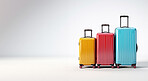 Suitcases on wheels on white copyspace background. Travel, vacation trip, visit to relatives concept