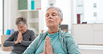 Senior people, yoga class and coach meditation, prayer and peace hands for exercise, holistic wellness and mindfulness. Spiritual workout, group and calm elderly women, clients and personal trainer