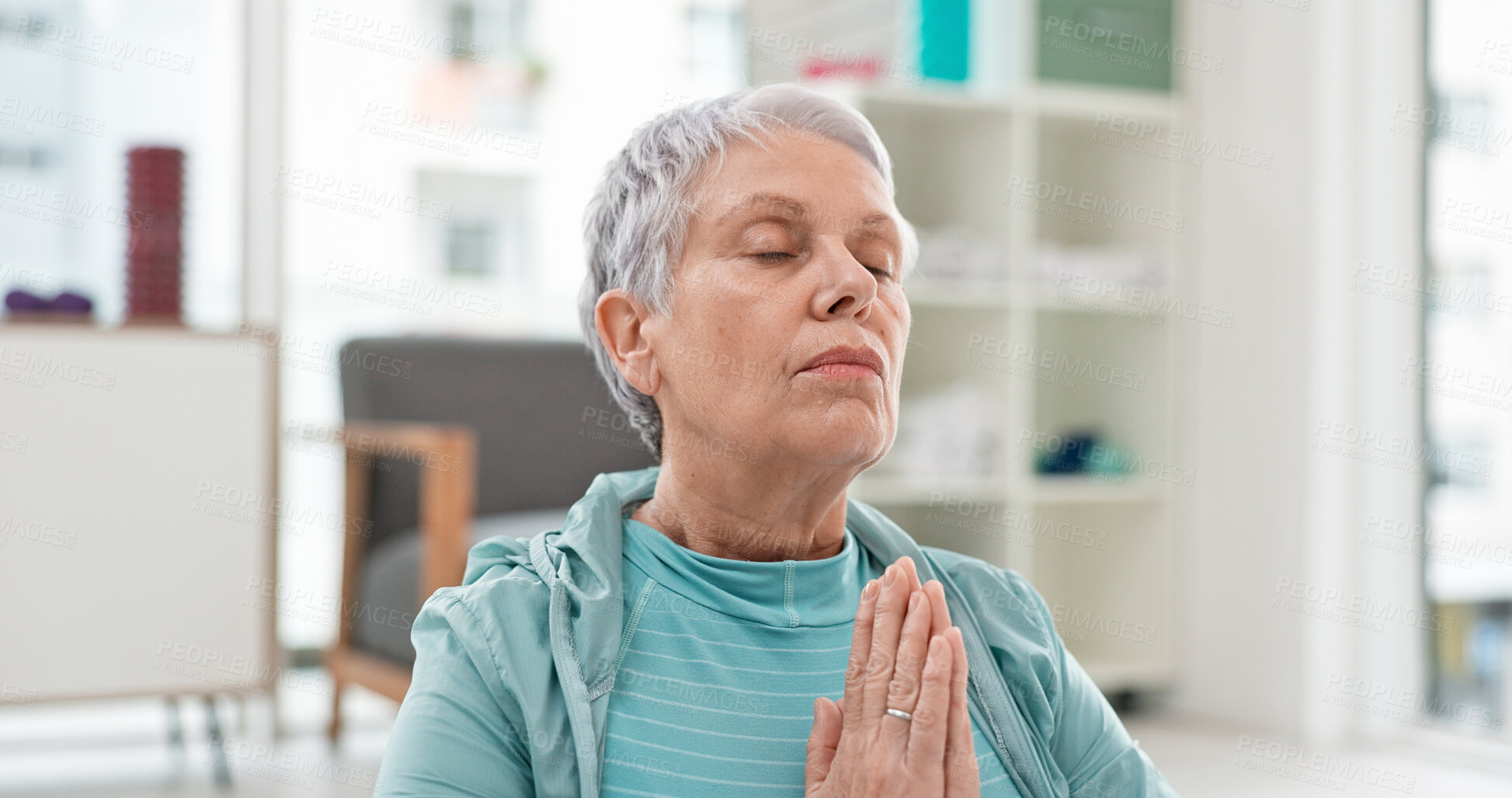 Buy stock photo Yoga, namaste meditation and woman breathing for mindfulness, senior exercise or healing at home. Face of healthy old lady, breathe and meditate with prayer hands for zen, wellness and focus on peace