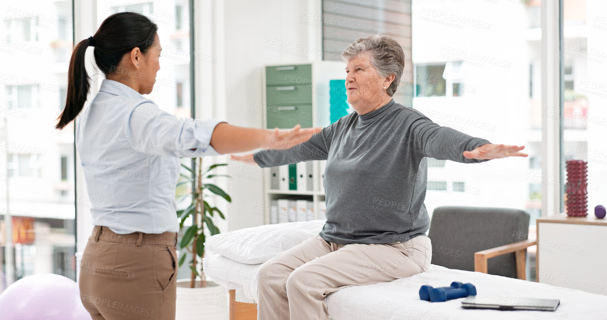 Buy stock photo Physical therapy, senior patient and chiropractor, stretching and motion with exercise and progress in consultation. Help, support and women at clinic, elderly care and fitness with health and physio