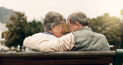 Buy stock photo Forehead, touch and senior couple in a park with love, happy and conversation with romantic bonding. Fun, old people and elderly man embrace woman with care, romance or soulmate connection outdoor