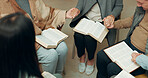 Praying, closeup and holding hands with people in bible study for support, Christian and spiritual. Community, faith and religion with prayer group in church for connection, worship and meeting