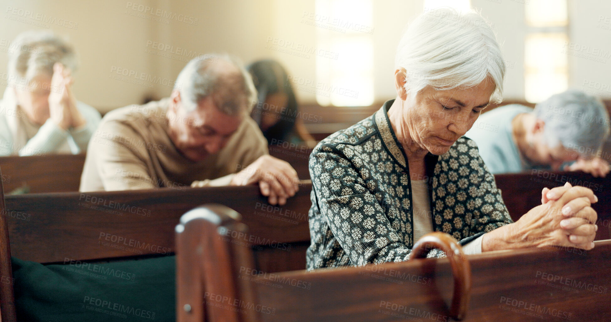 Buy stock photo Gospel, prayer or old woman in church for God, holy spirit or catholic religion in cathedral or Christian community. Faith worship, bow or elderly person in chapel or sanctuary to praise Jesus Christ