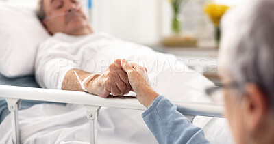Hospital, bedroom and senior couple holding hands, empathy and support husband recovery, healthcare problem or rehabilitation. Retirement, comfort or elderly woman care for sick cancer patient in bed