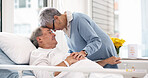 Hospital, love or elderly couple, sick patient and affection for empathy, marriage bond and support for senior person. Retirement healthcare, forehead and man with medical problem, cancer or disease