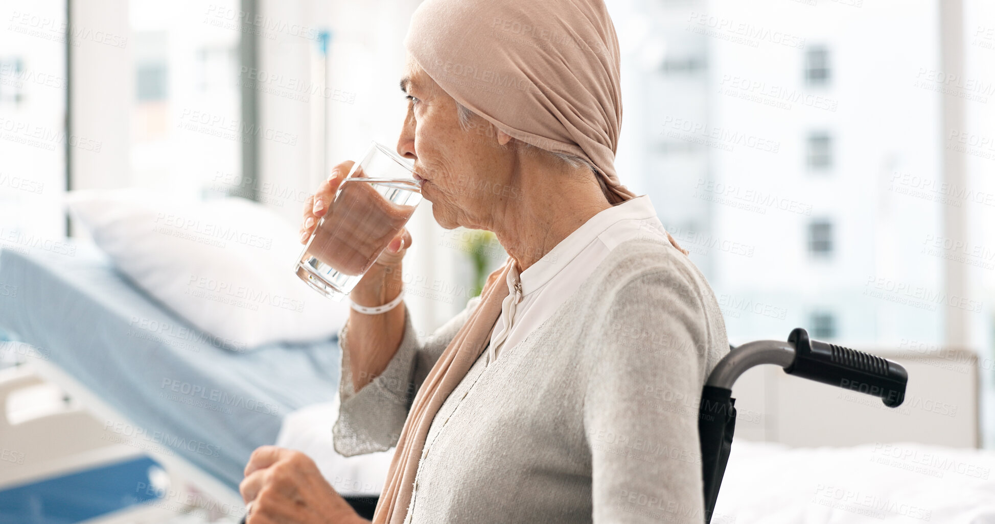 Buy stock photo Cancer, Parkinson and elderly woman at hospital in wheelchair with water after chemotherapy or treatment. Health, elderly care and female patient with disability, sickness or disease and depression