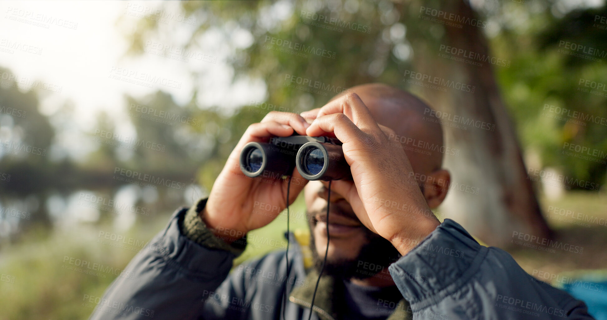 Buy stock photo Black man, hiking and looking through a binnacles on an adventure on vacation. Lake, nature and hot beverage with male person at camp for travel or rest in forest to relax on weekend.